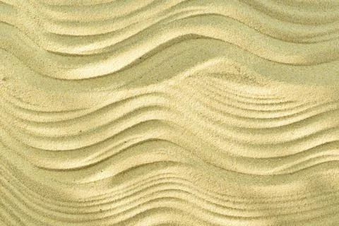 Abstract background with waves on the sand. The texture of beach sand Foto stock