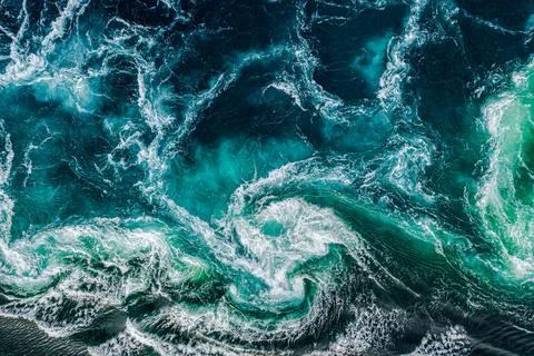 Abstract background. Waves of water of the river and the sea meet each othe.. Stock Photos