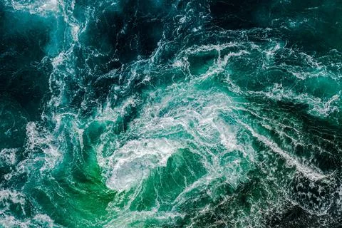 Abstract background. Waves of water of the river and the sea meet each othe.. Stock Photos