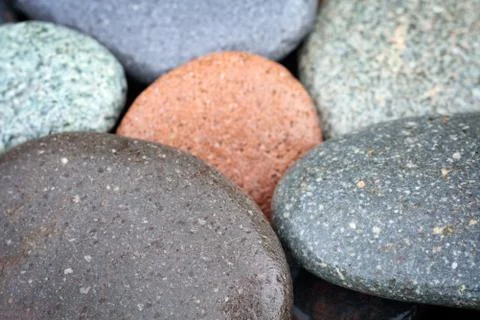 Abstract background with wet round multi-colored reeble stones 스톡 사진