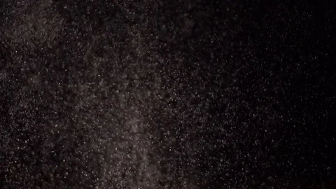 Abstract background. Wheat flour spots on black. HD Stock Footage 85299889