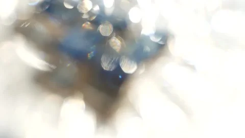 Abstract background - white and blue sparks glisten in the sun. Stock Footage 148315896