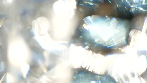 Abstract background - white and blue sparks glisten in the sun. Video stock 148315965