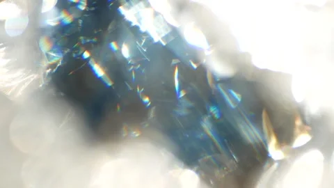 Abstract background - white and blue sparks glisten in the sun. Video stock 148316016