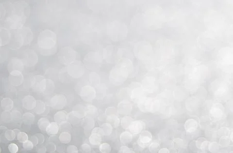 Abstract background with a white light blur . Stock Photos