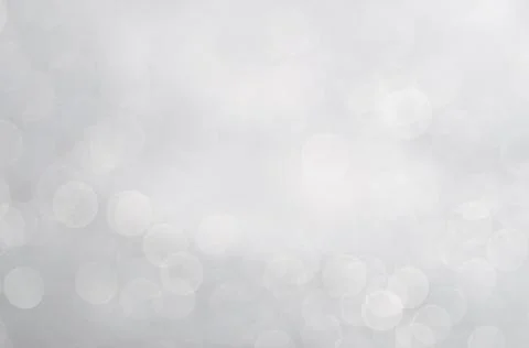 Abstract background with a white light blur . Stock Photos