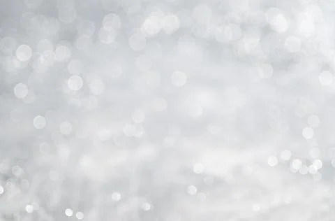 Abstract background with a white light blur . Stock Photos
