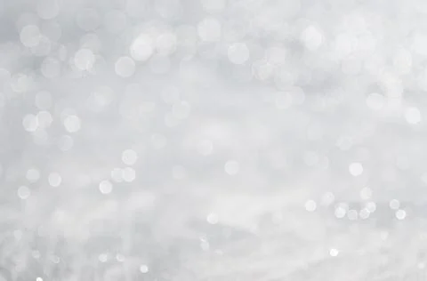 Abstract background with a white light blur . Stock Photos
