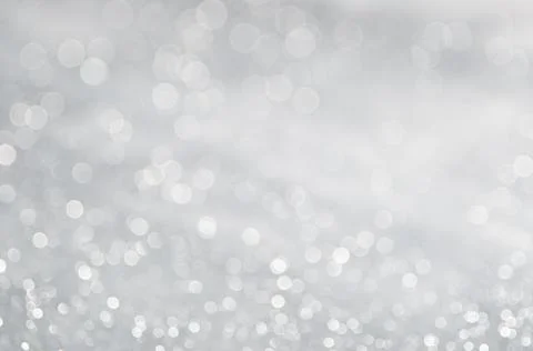 Abstract background with a white light blur . Stock Photos