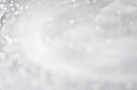 Abstract background with a white light blur . Stock Photos