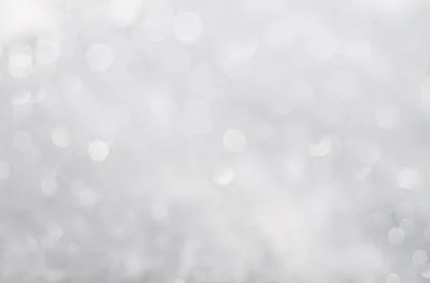 Abstract background with a white light blur . Stock Photos