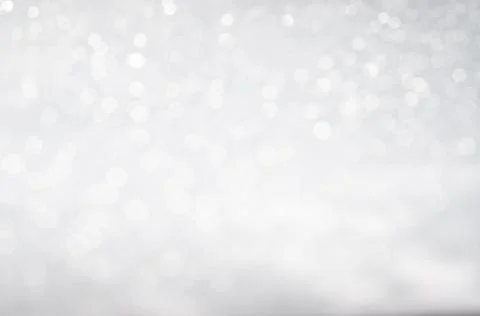 Abstract background with a white light blur . Stock Photos