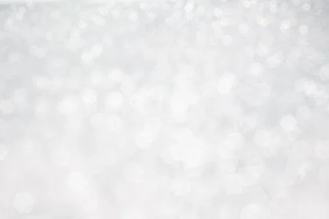Abstract background with a white light blur . Stock Photos