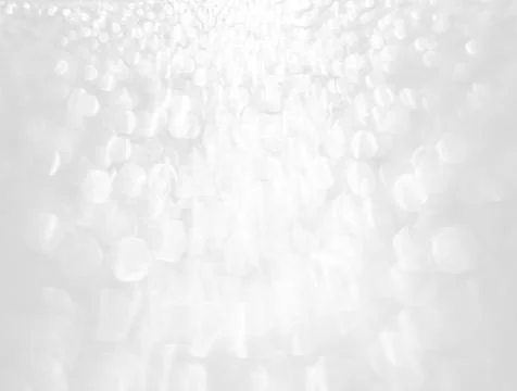 Abstract background with a white light blur . Stock Photos