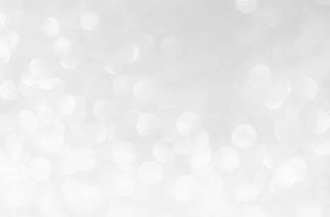 Abstract background with a white light blur . Stock Photos