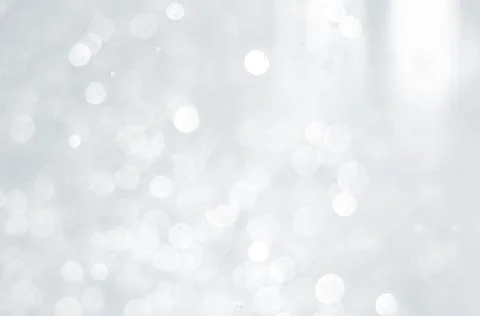 Abstract background with a white light blur . Stock Photos