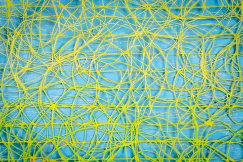 Abstract background of yellow threads on blue background Stock Photos