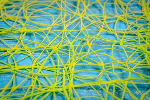 Abstract background of yellow threads on blue background Stock Photos