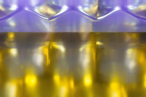 Abstract background with a zigzag line of violet color on a blurred backgroun Stock Photos