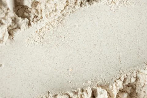 Abstract baking background with raw organic flour texture top down view Stock Photos
