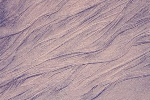 Abstract beach pattern formed by sand and water. Exotic forms of sand. Foto stock