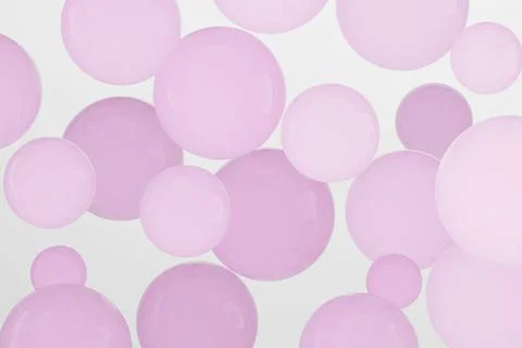 Abstract beautiful background with pink balls, bubbles of different sizes on a Stock Illustration