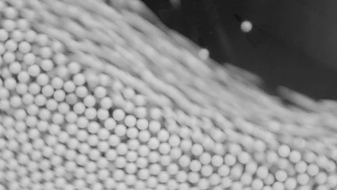 Abstract beautiful background. Small balls falling on drum  Video stock 98687803
