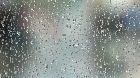 Abstract beautiful background with view through cafe window in rainy day on city Stock-Footage 79285008