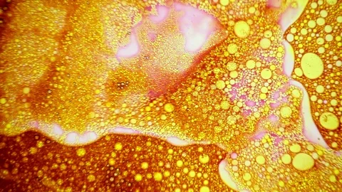 Abstract beautiful dinamic golden pattern appears on the surface of oil Stock Footage 124290451