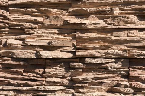 Abstract beige brown slate pattern stone block wall texture for background and Stock Photos