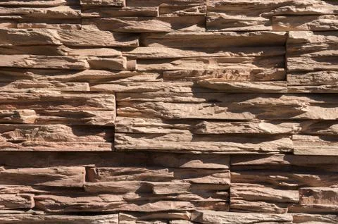 Abstract beige brown slate pattern stone block wall texture for background and Stock Photos
