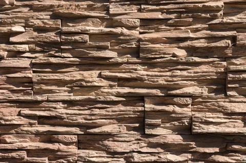 Abstract beige brown slate pattern stone block wall texture for background and Stock Photos