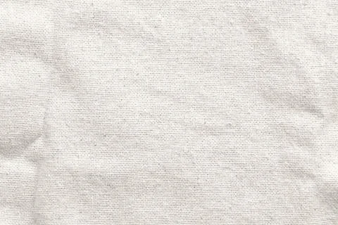 Abstract beige fabric texture with soft lines and delicate natural pattern Stock Photos