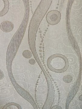 Abstract beige textile wallpaper pattern with elegant circular and wave desi Stock Photos