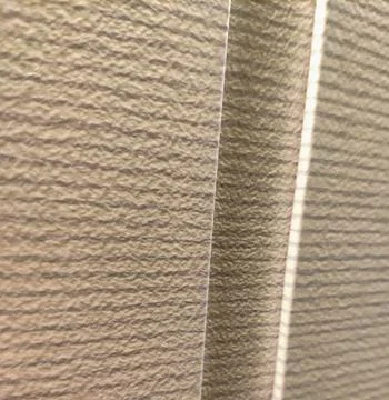 Abstract beige textured wall with soft light and shadows Stock Photos