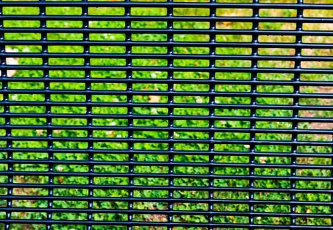 Abstract bench back grid with grass Stock Photos