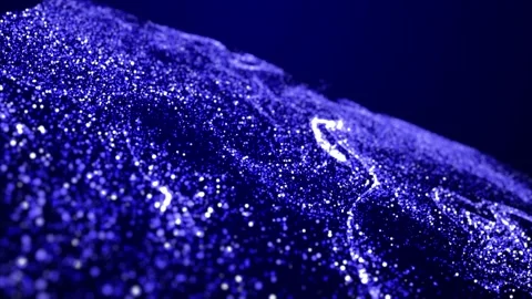 Abstract bg with blue magic glitters fly in air in slow motion and form Stock Footage 136577738