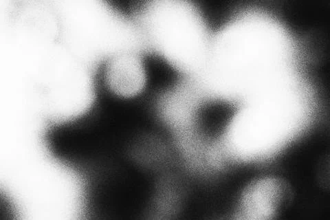 Abstract black and white blurred light bokeh background with copy space Stock Photos