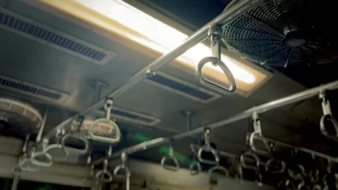 Abstract black and white concept showcasing handles in suburban trains of India Vidéo 308495348