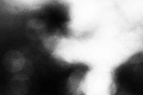 Abstract black and white light texture with soft bokeh and grain Stock Photos