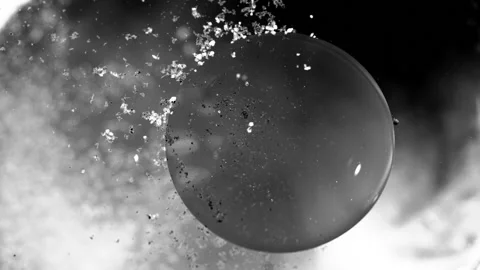 Abstract black and white liquid floating orbs and flakes background texture 스톡 동영상 130983953