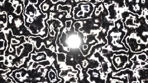 Abstract black and white pattern with bright center light Video stock 339078072