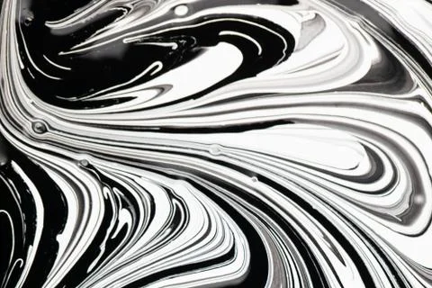 Abstract black and white pattern. swirls on liquid glossy paint surface Stock Photos