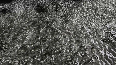 Abstract black and white texture of flowing water Video stock 280096398