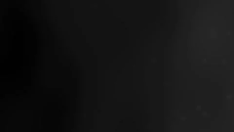 Abstract Black Background with Subtle Light Particles Motion Vidéo 312100809