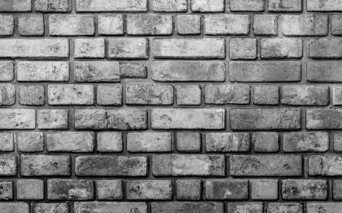 Abstract Black brick wall texture - Black and White Stock Photos