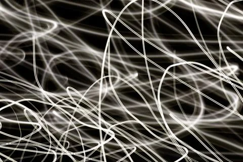 Abstract black light background. Long exposure photography Stock Photos