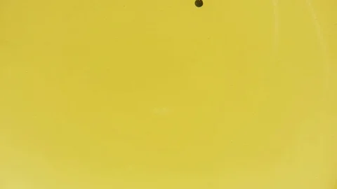 Abstract Black Paint Bubbles In Yellow Water Video stock 111531796