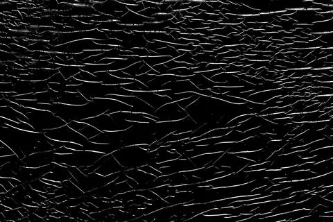 Abstract black textured surface with wave pattern background Stock Photos