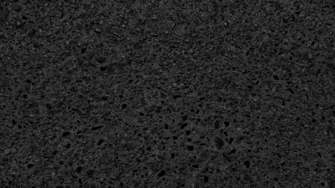Abstract black textured wall background with small stones of different shapes Stock Illustration